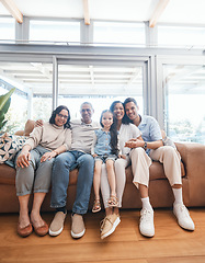 Image showing Big family in portrait with parents, grandparents and child on sofa in new house, happiness and quality time. Happy people, women and men with kid on sofa to celebrate property investment with smile.