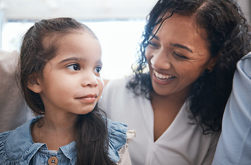 Image showing Love, laughing and mother with child in a living room, talking and excited while bonding in their home. Funny, family and girl with parent in a lounge with joke, humor and silly conversation together