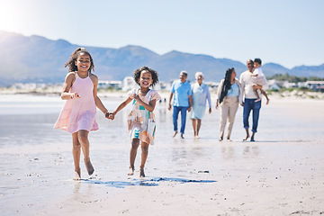 Image showing Children running, family bonding and happy at the beach for travel, morning walking and holiday. Smile, summer and girl siblings holding hands on a walk at the ocean with parents and grandparents