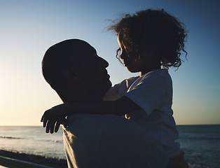 Image showing Silhouette, father and girl hug, beach and bonding with summer holiday, loving and quality time. Family, dad and daughter embrace, seaside vacation and getaway trip with happiness, break and loving