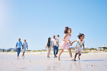 Image showing Family, beach and children running with space for mockup in summer for adventure, love and travel together. Men, women and girl kids by ocean with parents, grandparents and mock up with blue sky