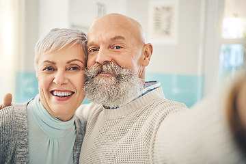 Image showing Selfie, love and a senior couple in their home together, posing for a social media profile picture together. Photograph, portrait or face with an elderly man and woman posting a status update online