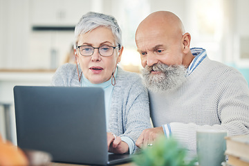 Image showing Laptop, senior couple and typing in home, internet browsing or social media in house. Computer, retirement and man and woman reading email, news or streaming video, movie or film together online.