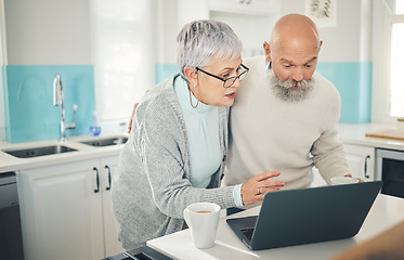 Image showing Laptop, elderly couple and coffee in kitchen, internet browsing or social media in home. Computer, retirement and man and woman reading email, news or streaming video, movie or film together online.