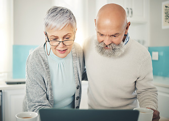 Image showing Senior couple, laptop and video call in home kitchen, internet browsing or social media in house. Computer, retirement and man and woman on videocall, online chat or virtual communication together.