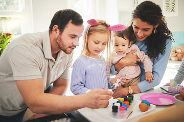 Image showing Family, painting and eggs with kids learning to be creative on table at easter or color brush at home. Children, happy mother and father decorating together or dad with mom teaching young girl art.