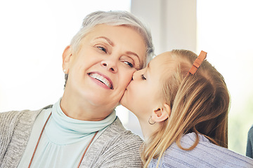 Image showing Kiss, care and child kissing grandmother on the cheek as love, happiness and support for family in a home. Smile, bonding and kid showing affection for a senior woman or grandma as gratitude