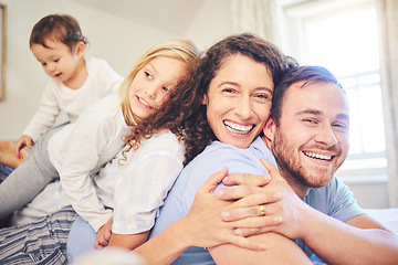 Image showing Family, portrait and happy smile in a home bedroom with children and parents together on bed for quality time. Man and woman or mother and father with children for happiness, love and care in morning