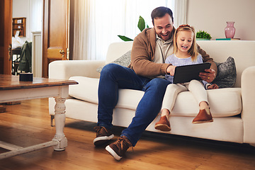 Image showing Father, child and a tablet for learning in a family home while happy and excited for education internet. A man or dad and girl kid on the sofa for streaming, mobile app and website for development