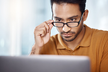 Image showing Business, glasses and man with a focus, online reading and check website for information. Male employee, consultant and worker with eyewear, clear vision and thinking for new project and research