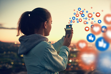 Image showing Social media emoticons, sunset or woman taking a photo of view for photography content or online post. Nature, icon overlay or girl on mobile app, website or network with love, like or heart emoji