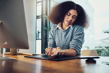 Image showing Business woman, hands and computer with wrist pain, overworked or joint inflammation on office desk. Hand of female employee suffering from carpal tunnel syndrome, bad ache or discomfort at workplace