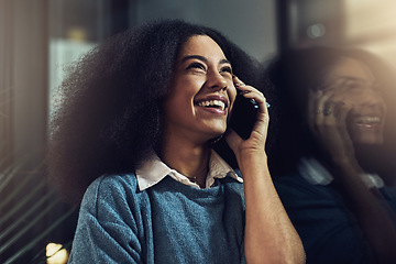 Image showing Happy woman, phone call and laughing at night for funny joke, talking or conversation at the office. Face of female with smile and laugh on mobile smartphone working late for fun business discussion