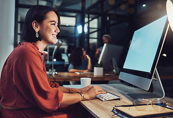 Image showing Night, business and woman typing, smile and digital planning for company growth, proposal and website launch. Female employee, consultant and worker with computer, screen or working late for deadline