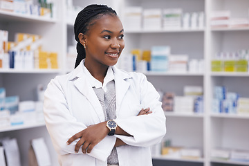 Image showing Pharmacy, pharmacist thinking or portrait of black woman with arms crossed in healthcare drugstore or clinic. Contemplate, hospital or happy doctor with innovation or ideas about medicine on shelf