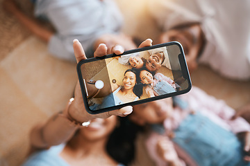 Image showing Happy, relax and selfie of family on floor of living room for social media, communication and internet from above. Website, funny and picture with parents and children at home for love and bonding