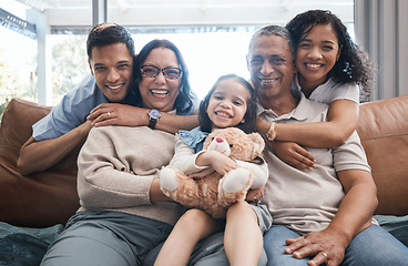 Image showing Portrait of parents, grandparents and child with teddy bear on sofa in new house, happiness and quality time. Happy family, women and men with kid on couch to celebrate property investment with smile