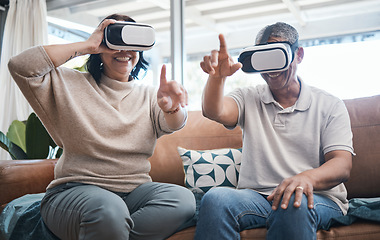 Image showing Senior couple, virtual reality and sofa in home living room with esports, metaverse or internet gaming with smile. Man, woman and vr with happiness, learning and futuristic goggles on lounge couch