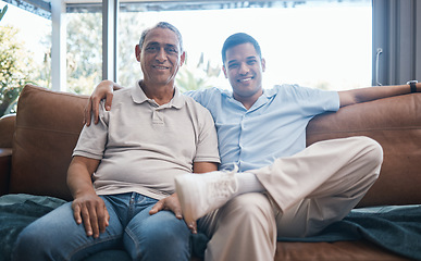 Image showing Portrait of happy man with senior father on sofa, happiness and quality time together in living room of home in Mexico. Love, support and men on couch in lounge with smile, dad and adult son in house