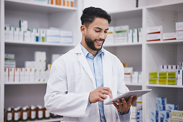 Image showing Pharmacy, happy man or doctor reading tablet medicine or checking medical prescription pills on shelf. Digital or pharmacist with online checklist on clinic shelves or drugstore inventory storage