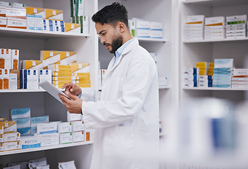 Image showing Pharmacy, man or pharmacist with tablet for research or checking medical prescription on shelf. Digital, healthcare or doctor typing online checklist on clinic shelves or drugstore inventory storage