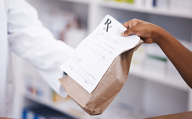 Image showing Retail, medicine or pharmacist hands a person a bag in drugstore with healthcare prescription receipt. Zoom, shopping or doctor giving customer product, pills or package for medical pharmacy services