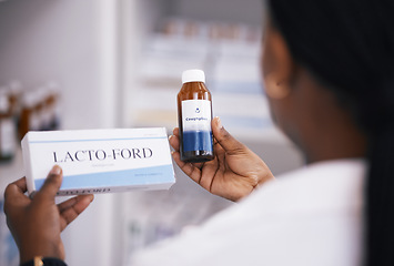 Image showing Pharmacist, pills or hands of woman with medicine bottle in drugstore for healthcare stock inventory. Zoom, clinic or nurse checking or reading label info on medical products or tablets in pharmacy