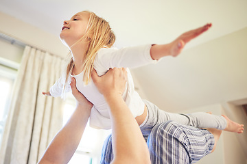 Image showing Playing, airplane and parent with daughter in bedroom for bonding, support and happiness. Smile, relax and weekend with young girl playing in family home for freedom, morning and wake up