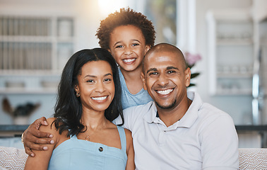 Image showing Portrait of mother, father and son on sofa for bonding, quality time and relax with parents at home. Love, living room and happy mom, dad and child on couch with smile embrace, hugging and resting