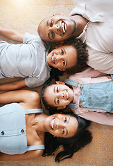 Image showing Family, portrait and top view smile on carpet, bonding or having fun together. Parents, happiness above and children relaxing or lying on floor with man and woman, care or enjoying time in home.