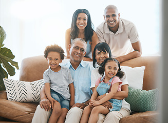 Image showing Portrait, love and big family on a couch, smile and bonding with happiness, cheerful or joy at home. Face, grandparents or mother with father, siblings or children on a sofa, chilling or quality time