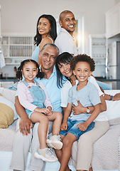 Image showing Big family, portrait and happy in home on sofa in living room, bonding or relaxing. Grandparents, parents and smile of children on couch, care and enjoying quality time together in lounge in house.