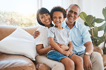 Image showing Portrait, grandparents and kid smile in home living room on sofa, bonding or having fun. Family, happiness or child with grandma and grandpa, care or enjoying quality time together on couch in lounge