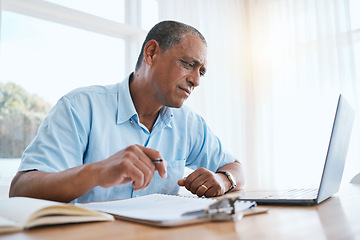 Image showing Businessman, laptop and remote work thinking with documents in finance, budget or planning at home office. Thoughtful man freelancer working on computer with financial paperwork for schedule plan