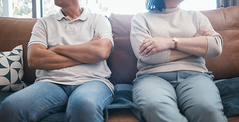 Image showing Angry couple, fight and arms crossed with divorce, marriage and break up problem in living room. Home, sofa and woman and man together with conflict and anger from frustration in a relationship