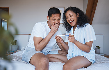 Image showing Pregnant, test and excited couple in bedroom with positive results, good news and celebration at home. Pregnancy, maternity and happy man and woman on bed with for fertility, family and surprise