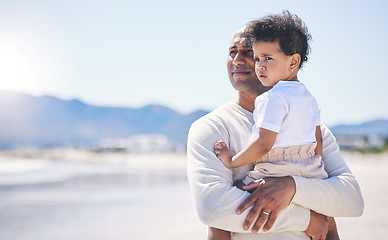 Image showing Father, holding boy and mockup space at beach with bond, care or love in summer sunshine on holiday. Man, male baby and hug with thinking, vision and family with support, sea vacation and mock up