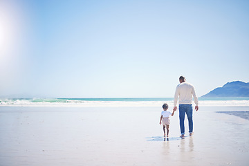 Image showing Father, boy and beach with mockup space, holding hands and blue sky with bonding with vacation in summer. Papa, male kid and solidarity with trust, holiday and ocean mock up with waves in sunshine