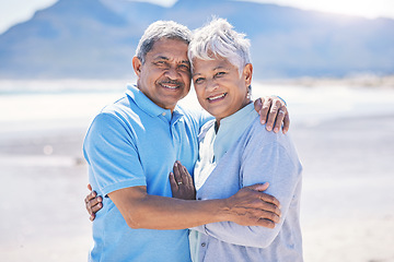 Image showing Senior couple, hug and beach love portrait outdoor with romance in nature. Ocean, elderly and old woman and man smile together on summer holiday by the sea feeling happiness and relax on vacation