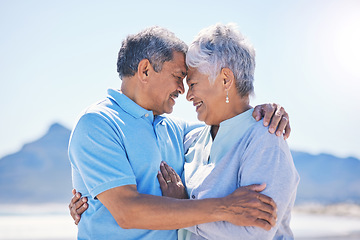 Image showing Senior couple, hug and beach love outdoor with support and romance in nature. Ocean, elderly and old woman and man together on summer holiday by the sea feeling happiness and relax on vacation