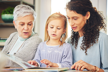 Image showing Grandmother, mama and girl reading a book, bonding and happiness for fun, quality time and relax. Family, parent or granny with mom, daughter or female child with storytelling, literature or learning