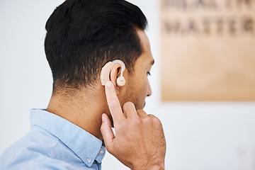 Image showing Hearing aid, deaf and man with ear disability with medical support device as wellness innovation or audiology implant. Patient, auditory and male person with an amplifier for help listening