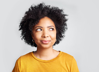 Image showing Thinking, curious and African woman in studio with idea, decision or choice against grey background. Idea, contemplation and female choosing, unsure and wondering, deciding and ponder while isolated