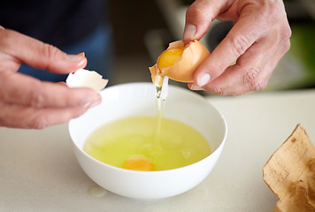 Image showing Egg, food and hands cooking breakfast in the kitchen for hunger, preparation and morning routine. Diet, healthy and a man with eggs for protein, lunch and preparing a meal at home for health