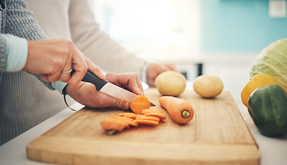 Image showing Cutting board, closeup or couple hands cook vegetables in a kitchen for healthy, vitamins and nutrition diet in a home. Meal, chef and people preparing fresh produce or salad together for dinner