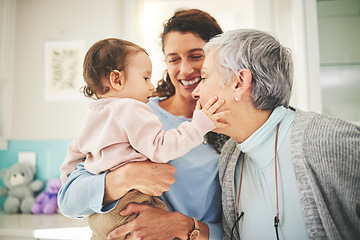 Image showing Grandmother, mother and baby in home for playing, quality time and bonding together in living room. Love, happy family and mom carrying child with grandma play for loving, affection and happiness