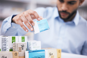 Image showing Pharmacy stock, man hands and retail check of a customer in a healthcare and wellness store. Medical inventory, drugs box and pharmaceutical label information checking of a person by a shop shelf