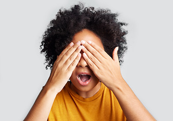 Image showing Cover, shocked and hands on face of woman in studio for surprise, horror and fear. Wow, announcement and danger with female hiding on white background mockup for scared, alert and notification