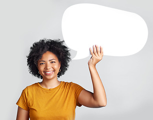 Image showing Speech bubble, portrait and happy woman in studio with mockup, message and space on grey background. Banner, poster and African female with social media, news or announcement on isolated billboard