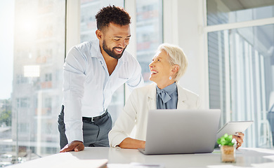 Image showing Office, laptop and business people laughing at funny partnership joke, online review or customer experience feedback. Comedy, diversity and collaboration team work on communication research report